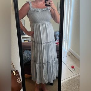 White and denim blue stripped dress with flowy top detail. Size LARGE. Worn once